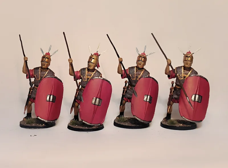 Legionarios romanos con escudos rojos y pilum